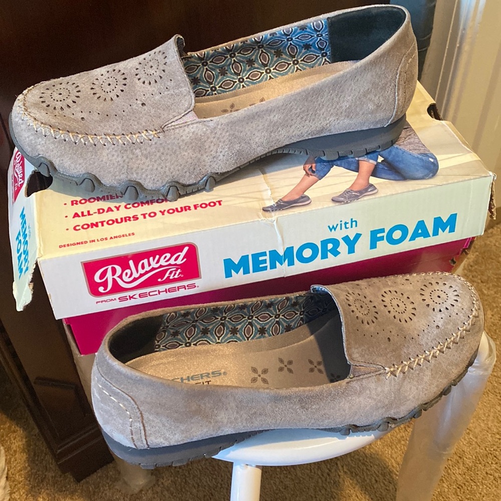 Sketchers memory foam loafer with laser cut design suede upper